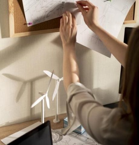 close-up-woman-with-blueprints